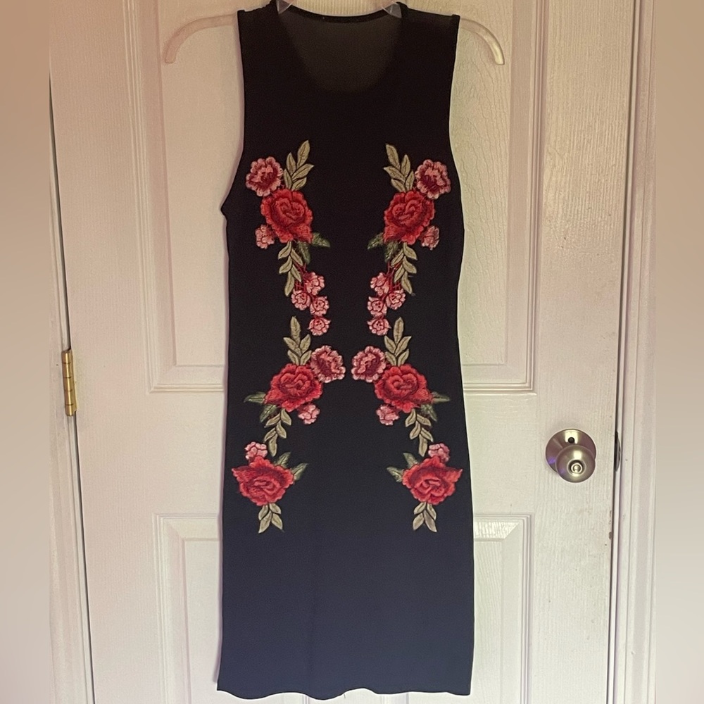 Black dress with sheer onset and floral details size small